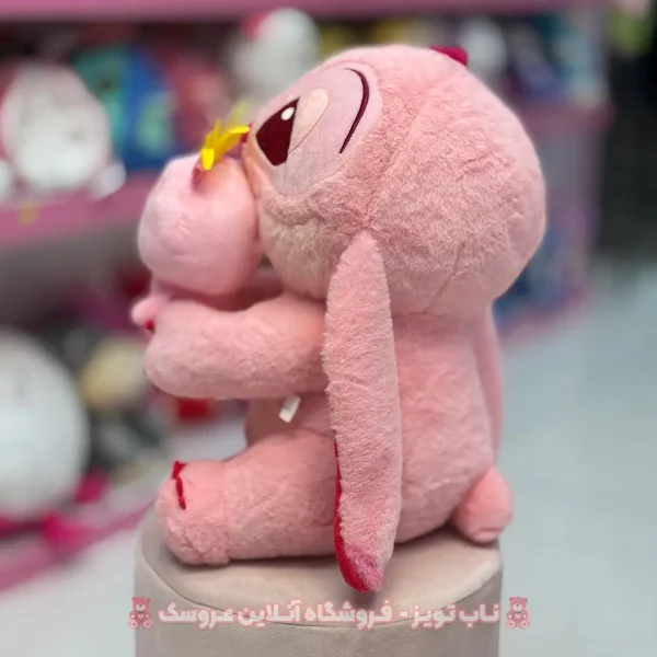 عروسک استیج صورتی زامبی به دست