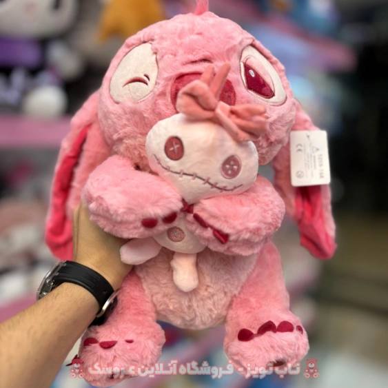 5929157938331192278 عروسک استیج زامبی به دست صورتی