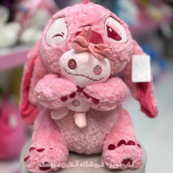 5929157938331192285 عروسک استیج زامبی به دست صورتی